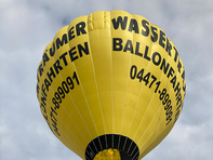 Gelber Heißluftballon